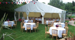 Marquee in Garden Party with tables