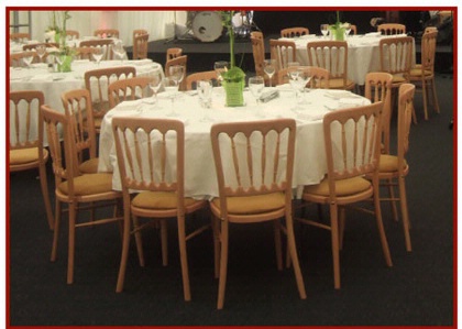 Wooden Banquet Chairs around Table